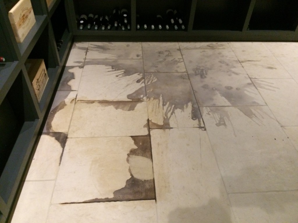 Red wine stain on stone floor